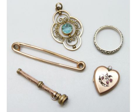 A 9ct back and front locket with silver setting, a miniature propelling pencil, a 9ct gold on silver ring, a gilt pendant set