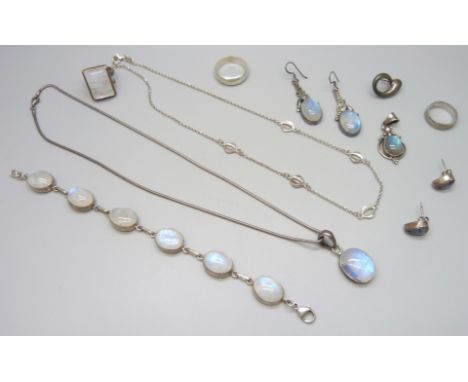A collection of silver moonstone set jewellery including earrings, a bracelet, a ring, etc., 84g