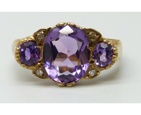 A 9ct gold, amethyst and diamond ring, 4g, M/N