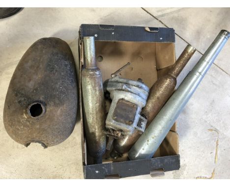 A vintage BSA gearbox, an unknown petrol tank and three silencers. 