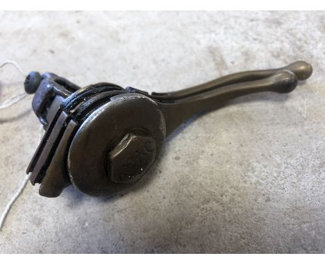 A pair of vintage brass levers. 