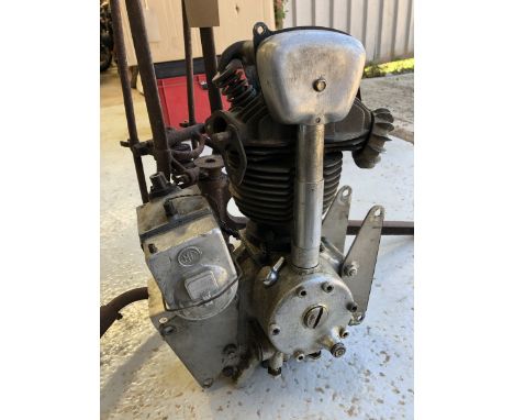 A Rudge 250cc engine including magneto by repute with good spark and compression no. 1960 plus a pair of unknown girder forks