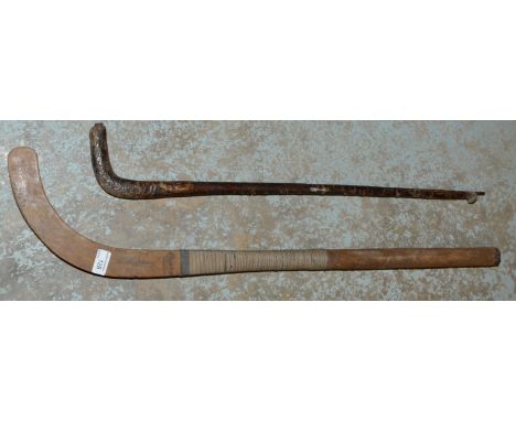 Bussey London hockey stick and one other 