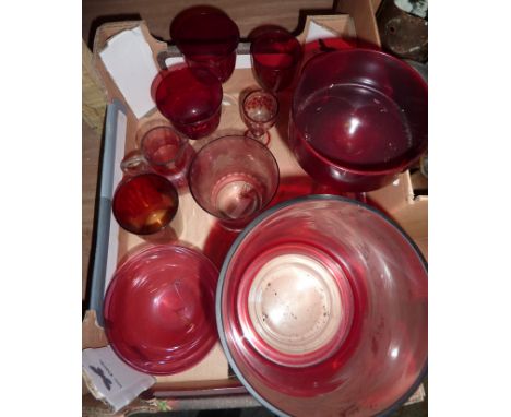 Box of assorted coloured glass including a small cranberry jug, ruby etched glass beaker, wine glasses etc 