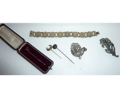 9ct Gold amethyst stick pin and two others, a coin bracelet, marcasite flower brooch and one other 