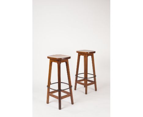 Robert Thompson of Kilburn (British, 1876-1955) Mouseman pair of bar stools oak on four octagonal legs, joined by stretcher w