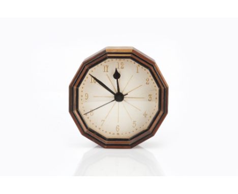 Hugh Birkett (British, 1919-2002) Cotswold School clock, circa 1990 specimen woods, 12 sided 12.3cm diameter