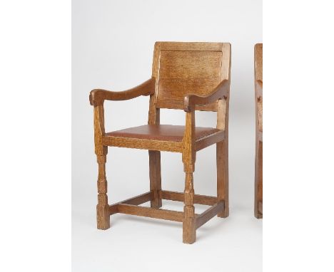 Robert Thompson of Kilburn (British, 1876-1955) Mouseman armchair oak, panel back and leather seat carved mouse 88cm high, 51