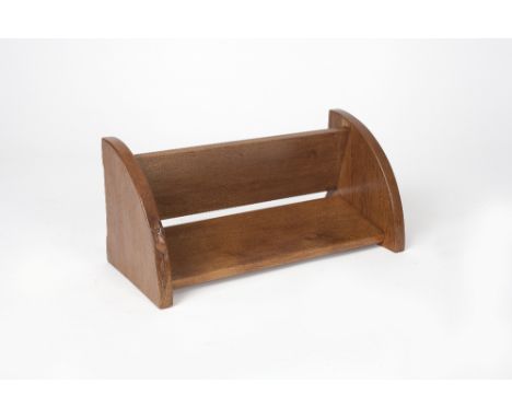 Robert Thompson of Kilburn (British, 1876-1955) Mouseman book rack oak carved mouse 46cm across.