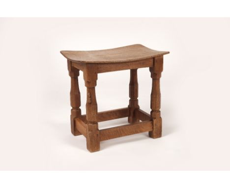 Robert Thompson of Kilburn (British, 1876-1955) Mouseman stool, circa 1970s oak, shaped top, octagonal supports carved mouse 