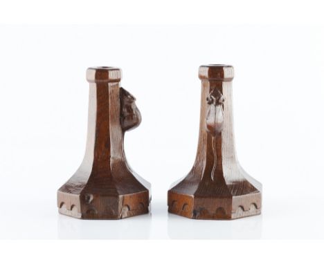 Robert Thompson of Kilburn (British, 1876-1955) Mouseman pair of early candlesticks oak, octagonal form carved mice 15.5cm hi