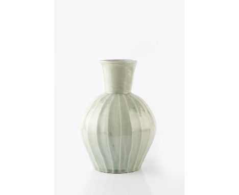 Trevor Corser (British, 1938-2015) at Leach Pottery Vase celadon, with cut facetted sides impressed potter's and pottery seal