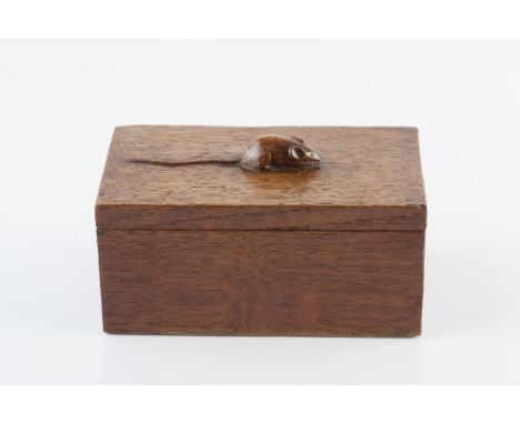 Robert Thompson of Kilburn (British, 1876-1955) Mouseman early box oak carved mouse 18cm across.