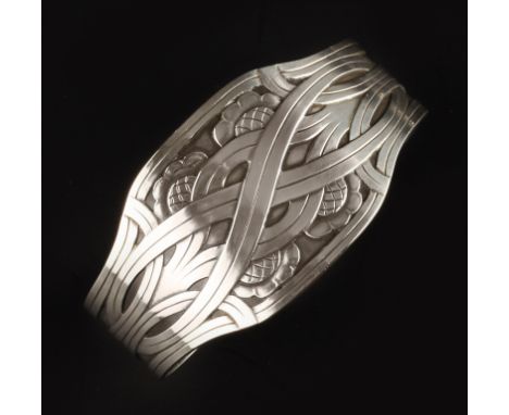 Harald Nielsen (Danish, 1892-1977) for Georg Jensen Cuff bangle with scrolling ribbons enclosing flowerheads numbered 55 sign