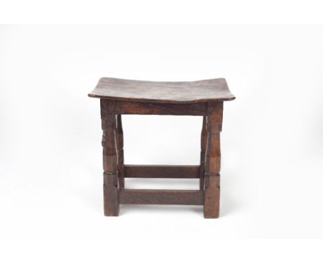 Robert Thompson of Kilburn (British, 1876-1955) Mouseman early stool oak, with dish shaped top carved mouse 36cm high, 41.5cm