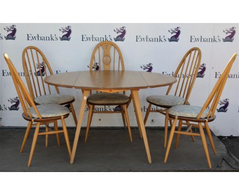 Ercol ash and elm set of four Windsor single chairs, a similar armchair with swan carved splat, and a drop leaf dining table,