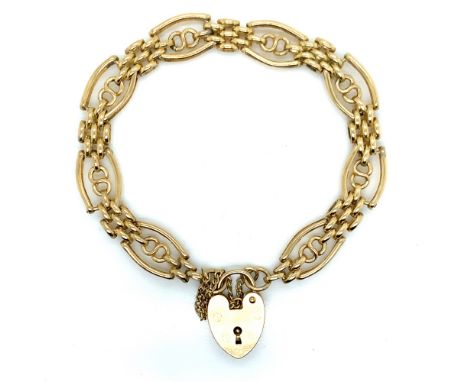 A 9ct HALLMARKED GOLD FANCY LINK GATE BRACELET. COMPLETE WITH SAFETY CHAIN AND PADLOCK CLASP. WEIGHT 11.98grms.