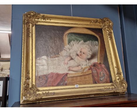 VICTORIAN SCHOOL, A BABY IN ITS BASKET WARE COT, OIL ON CANVAS.   64 x 76cms.