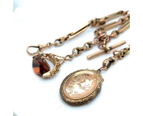 A VINTAGE OLD GOLD WATCH ALBERT COMPLETE WITH T-BAR, 9ct HALLMARKED SPINNING FOB PENDANT, AND A 9ct GOLD BACK AND FRONT ENGRA