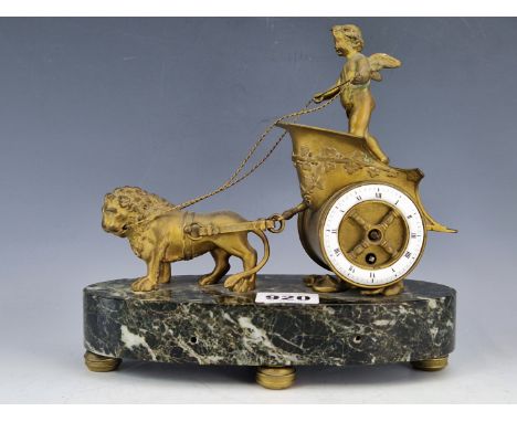 AN EARLY 20th C. ORMOLU CHARIOT CLOCK, THE BACK PLATE INSCRIBED H P &amp; CO BESIDE THE PLATFORM ESCAPEMENT, THE ENAMEL CHAPT