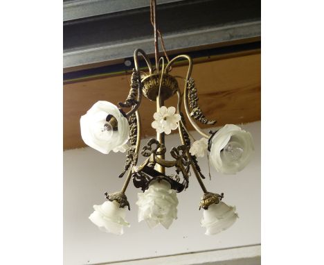 A FIVE LIGHT CHANDELIER EACH WITH FROSTED GLASS FLOWER FORM SHADES BELOW FOUR GLASS FLOWER HEADS