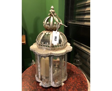 A SET OF FOUR ALUMINIUM AND CURVED GLASS CANDLESTICK LANTERNS WITH TWO TIER ONION DOME TOPS.   H 45cms.