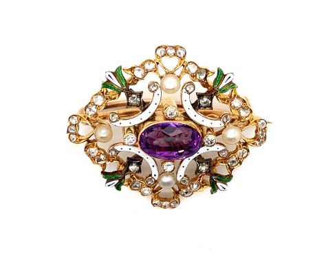 AN ANTIQUE SUFFRAGETTE PENDANT / BROOCH IN A FITTED CASE. THE PENDANT SET WITH AN OVAL CUT CENTRAL AMETHYST SURROUNDED BY SWA