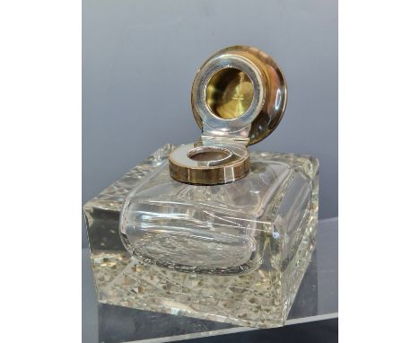 A SILVER MOUNTED SQUARE GLASS INKWELL BY DEAKIN AND FRANCIS, BIRMINGHAM 1922, THE FOOT OF THE GLASS HOBNAIL CUT