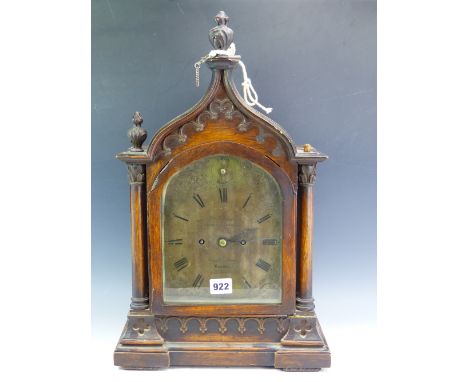 WILLIAM JOHNSON, LONDON, A 19th C. OAK GOTHIC CASED MANTEL CLOCK STRIKING ON A COILED ROD, THE SILVERED DIAL WITH STRIKE/SILE