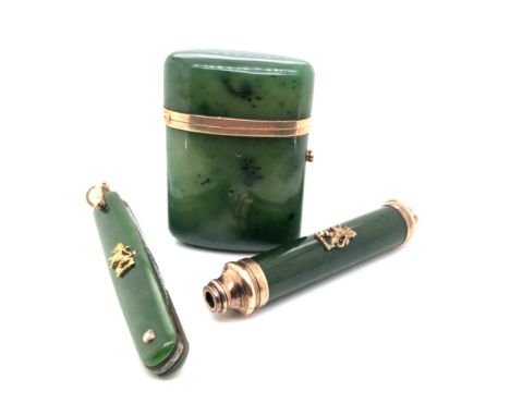 A SPINACH JADE TELESCOPIC RETRACTABLE PROPELLING GOLD BODIED AND MOUNTED PENCIL WITH RAMPANT LION CREST TOGETHER WITH A MATCH