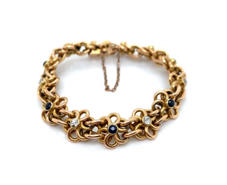 A VINTAGE 15ct GOLD, SAPPHIRE AND DIAMOND WOVEN FLORAL BRACELET. THE BRACELET FITTED WITH AN INTEGRATED STYLE BOX CLASP AND S