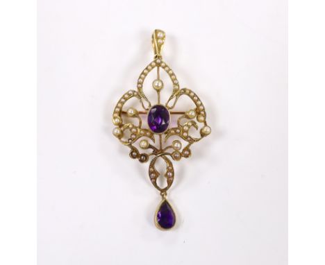 A late Victorian 15ct, amethyst and seed pearl cluster set drop pendant brooch, 55mm, gross weight 5.6 grams.