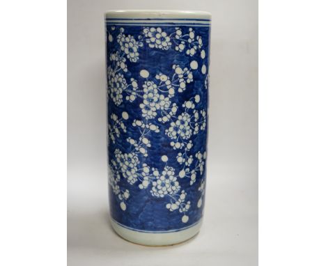 An early 20th century Chinese blue and white prunus stick stand, 44cm