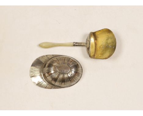 A George III silver jockey cap caddy spoon, Birmingham, 1798?, 54mm and another George III silver gilt shovel caddy spoon, wi