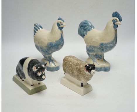 Four pieces of Rye Pottery to include a sow, ram, chicken and cockerel, 22cm