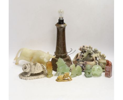 A Cornish serpentine novelty lighthouse lamp and mixed soapstone and hard stone carvings (12), lamp 25cm high