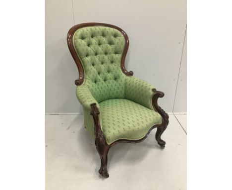 A Victorian carved mahogany button back armchair, width 70cm, width 70cm, height 109cm