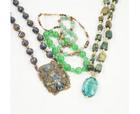 Three assorted Chinese bead necklaces including filigree gilt white metal and enamel pendant necklace, overall 68cm and a jad