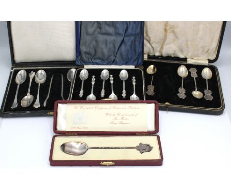 A cased set of six George V silver apostle spoons, hallmarked by Josiah Williams & Co, London, 1936; a cased set of six Georg