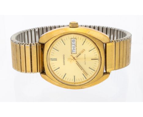Garrard- a gentleman's vintage gold plated automatic wristwatch, comprising a signed round gilt dial with applied baton marke