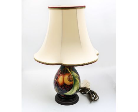 A Moorcroft lamp in the Queens Choice design by Emma Bossons, in good condition , with shade, lamp untested, second