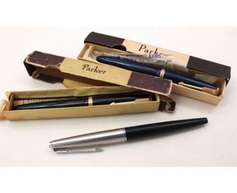 A boxed Parker Duofold blue celluloid fountain pen with 14k nib; another Parker Duofold black celluloid fountain pen with 14k