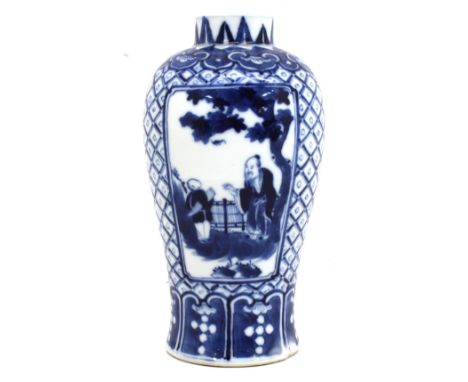 A 19th Century Kangxi blue and white character vase with ornate and deities detail, marks to base, 18cm high.
