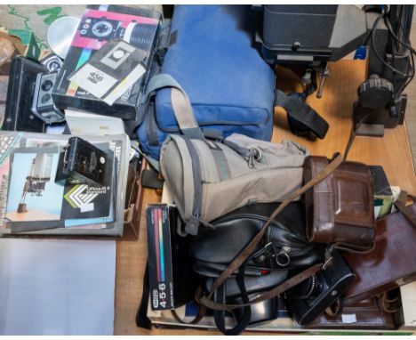 Two boxes of assorted cameras to include: Ensign, Kodak, Ful-Vue, Praktica and others, together with a Meopta Enlarger. Gener