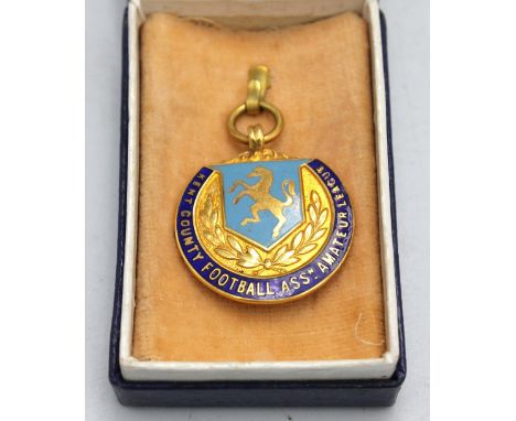 Football: A Kent County Football Association Amateur League 9ct gold and enamel fob medal, with enamelled shield and ground t