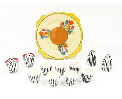 A Clarice Cliff 'Crocus' patterned plate with shaped border, Bizarre marks to reverse (scratches, wear and minor paint loss),