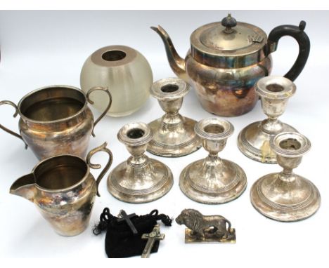 A small selection of silver to include: a pair of small George V silver candlesticks, weighted, hallmarked by P & C Ltd, Birm