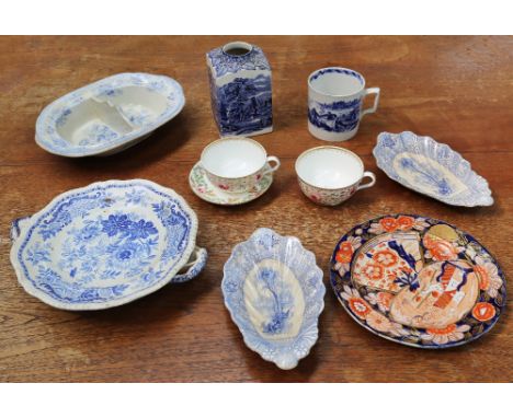 A collection of early 19th Century blue and white porcelain items in Spode plate warmer, a Masons caddy and others along with