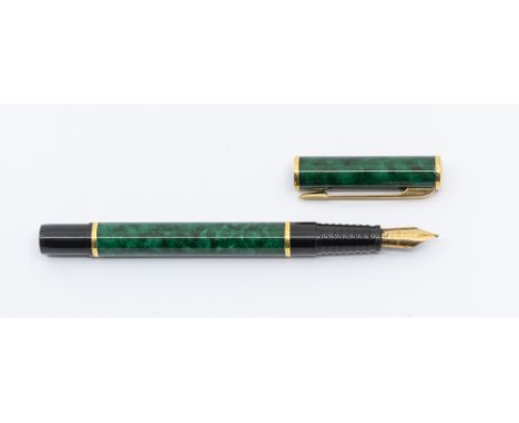 A vintage Waterman Laureat green marble fountain pen.