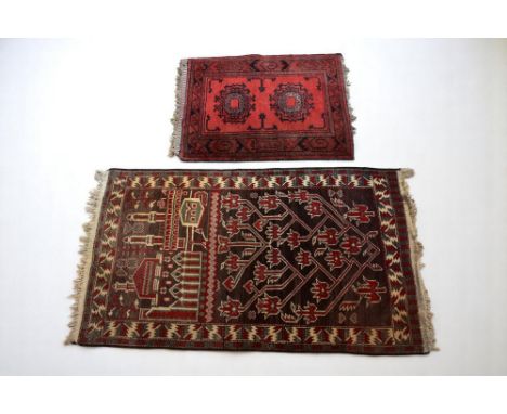A mid 20th Century hand knotted Iranian prayer rug along with a deep red Persian hand knotted rug/mat.